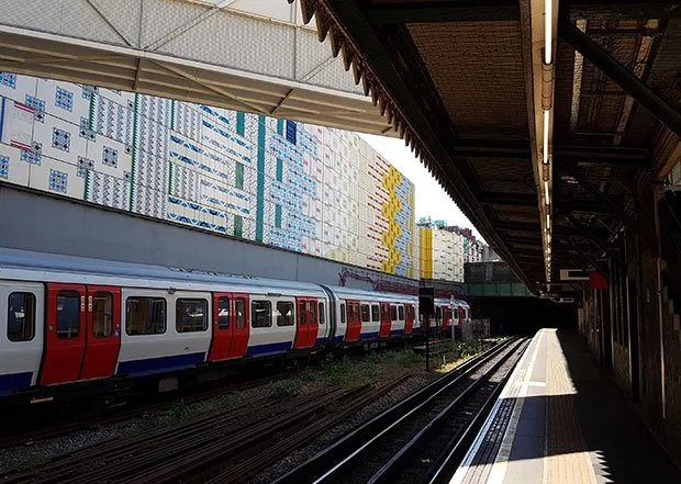Train at railway station with tracks