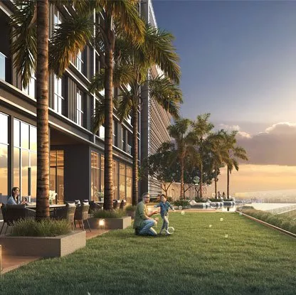 People relaxing on lawn near modern building